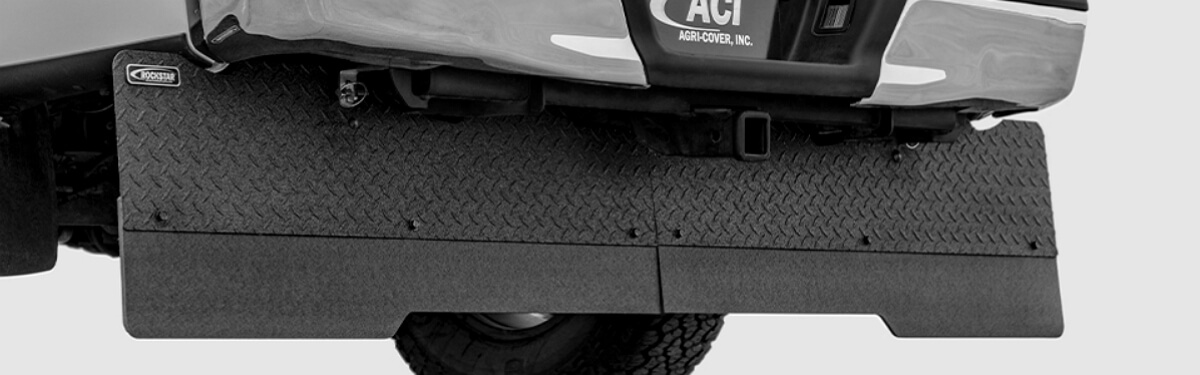 Rockstar Full-Width hitch mounted mud flaps mounted on the pickup truck